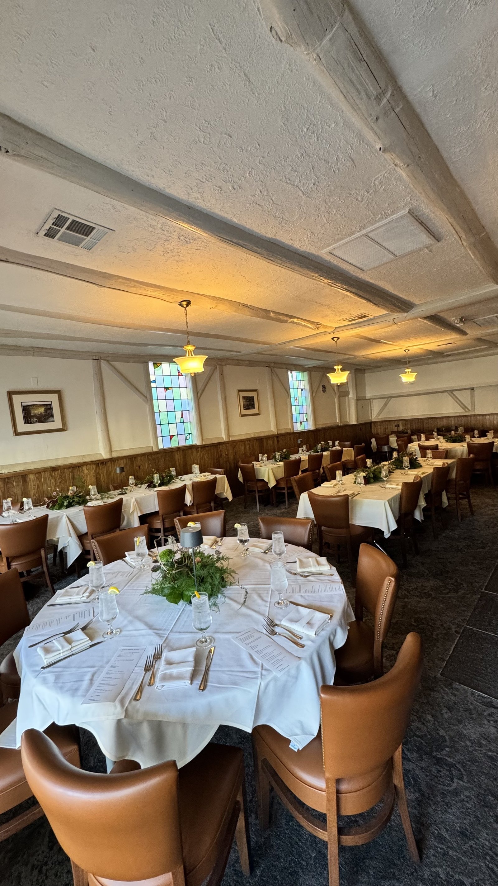 Main dining room set for a private event