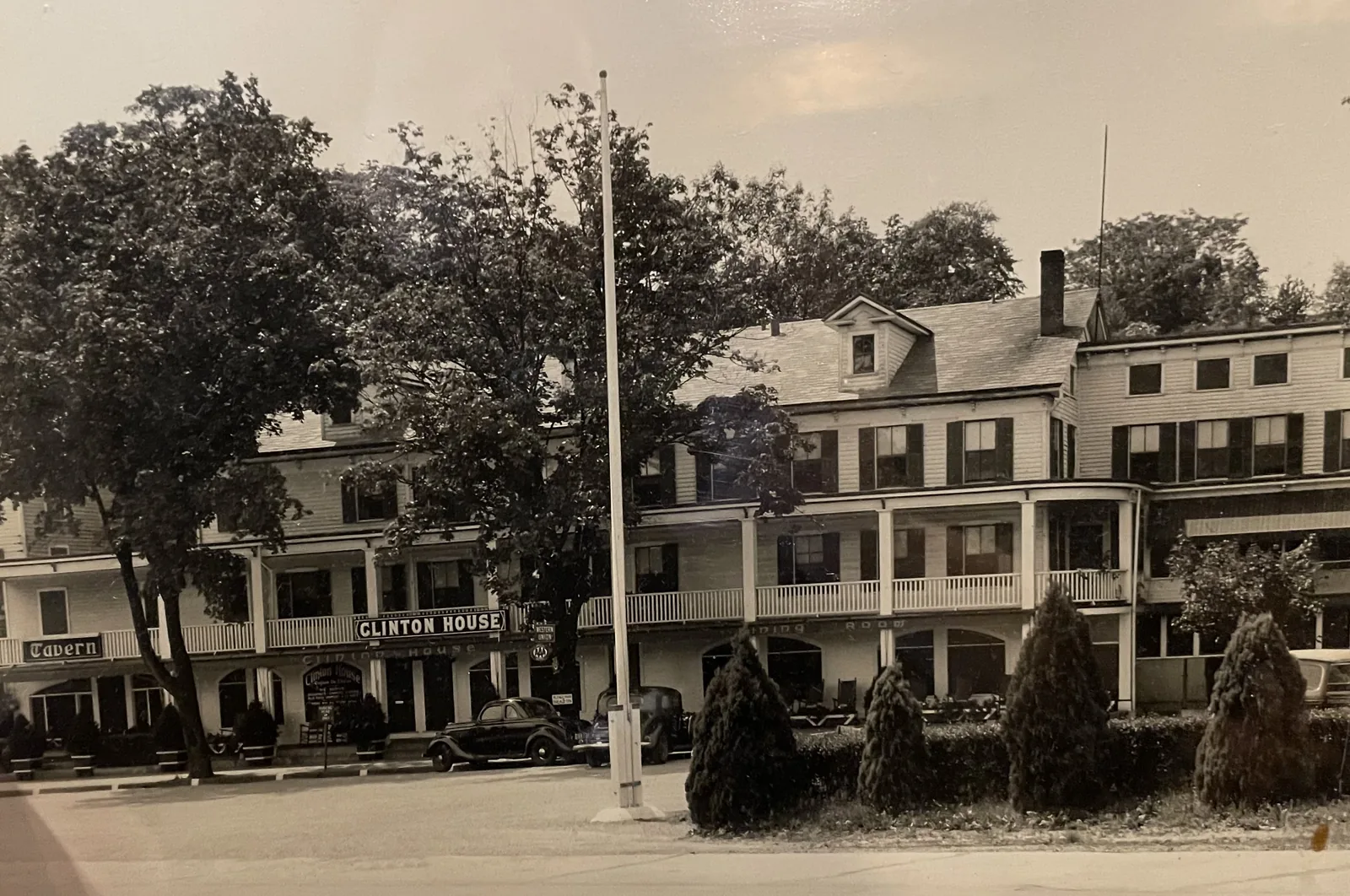 The Clinton House under summer elms on West Main Street
