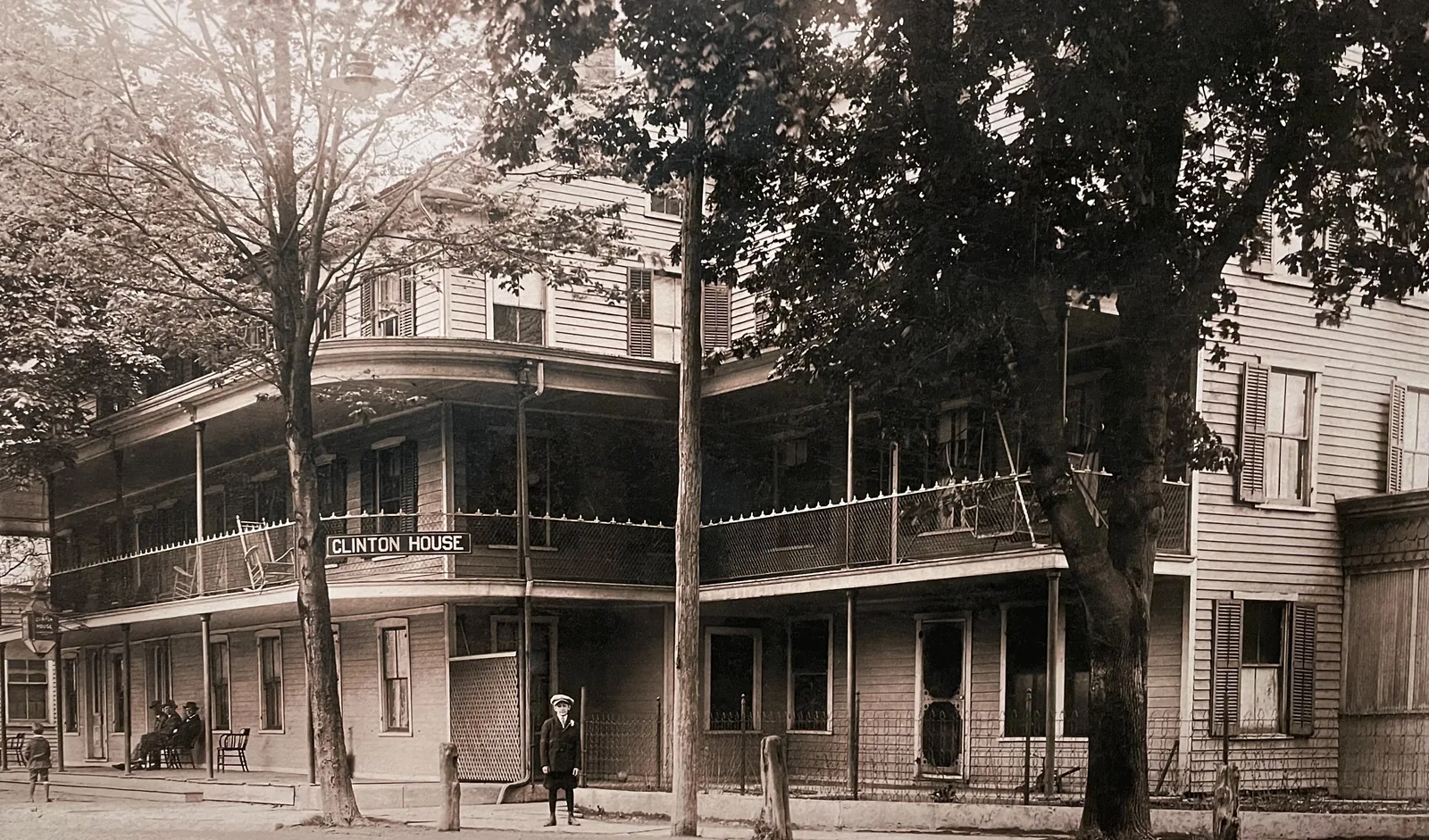 The Clinton House before its later additions, two stories under a wraparound porch