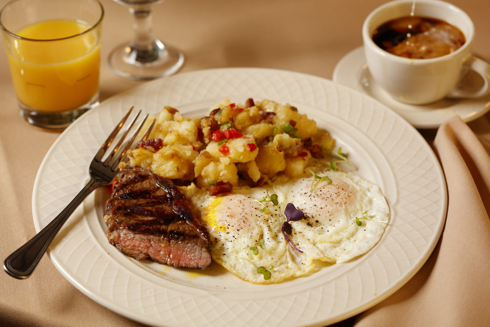 Steak and eggs with potatoes