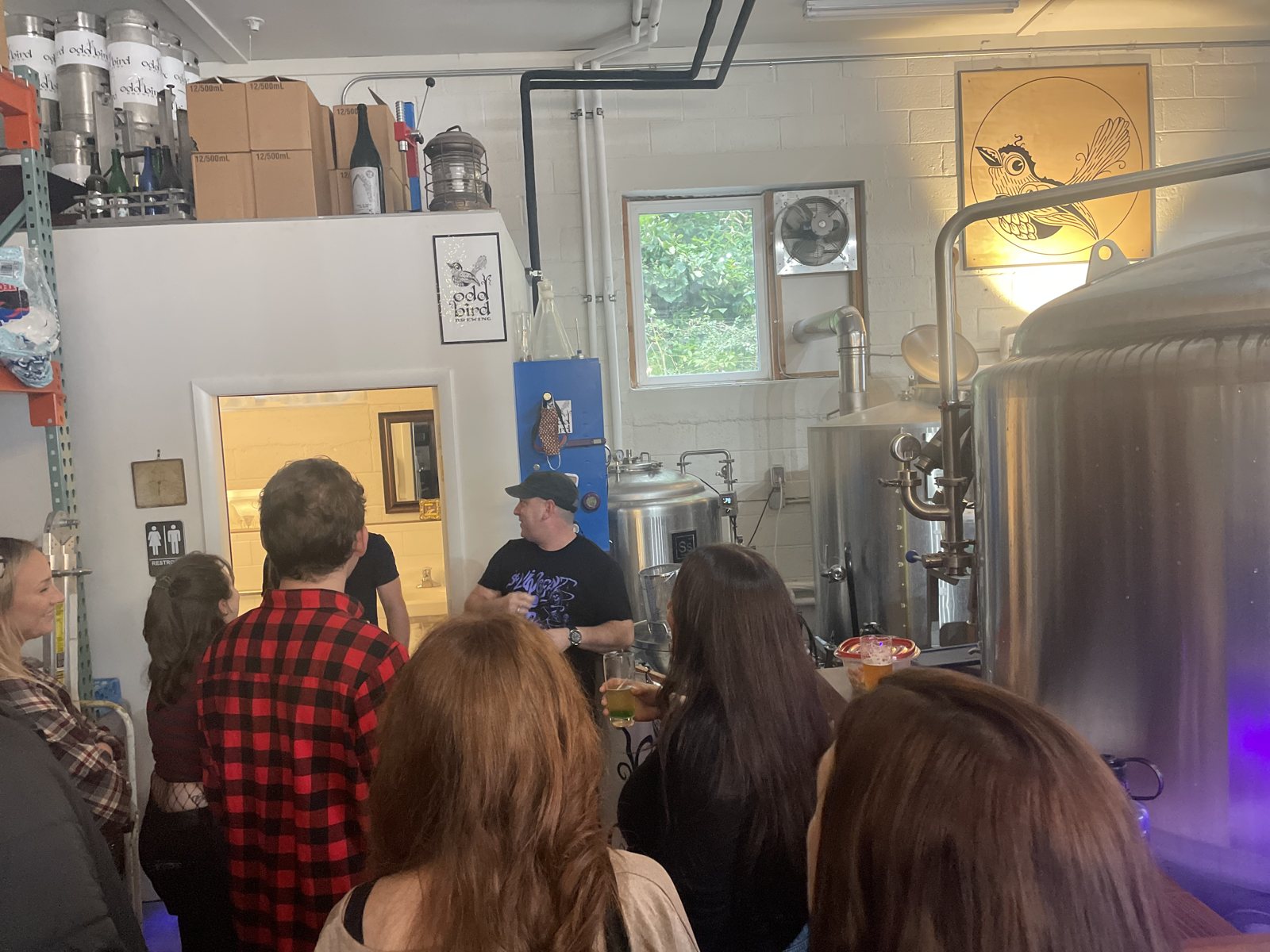 On a brewery tour during a team beer crawl.