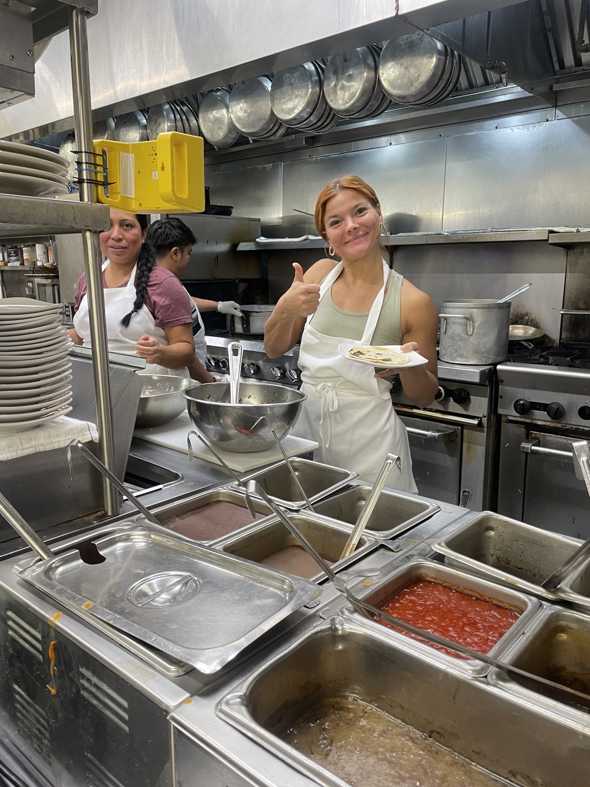 Cross-training on the kitchen line.