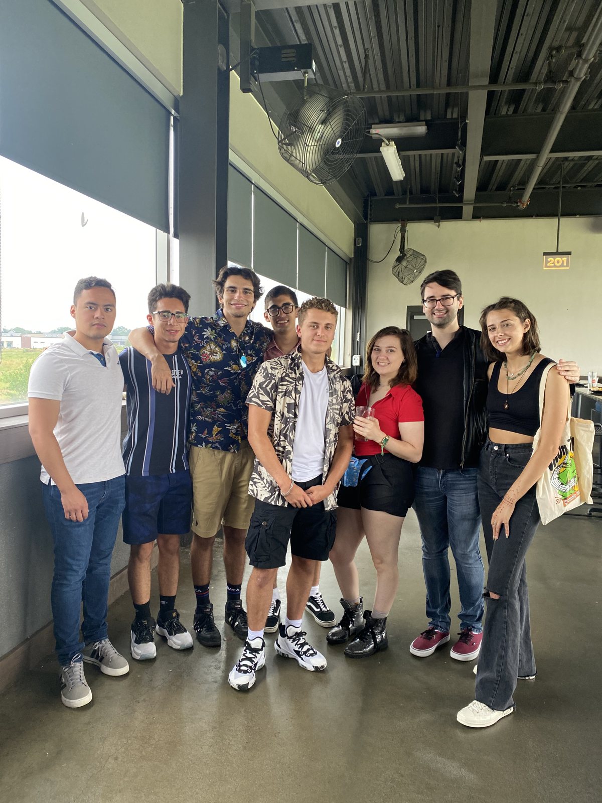 A staff TopGolf outing.